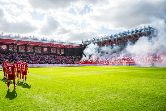 Spectators in the stands at Brann Stadion