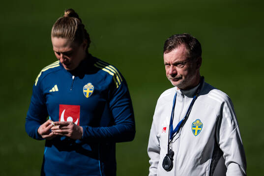 Goalkeeper Tove Enblom and head coach Peter Gerhardsson of