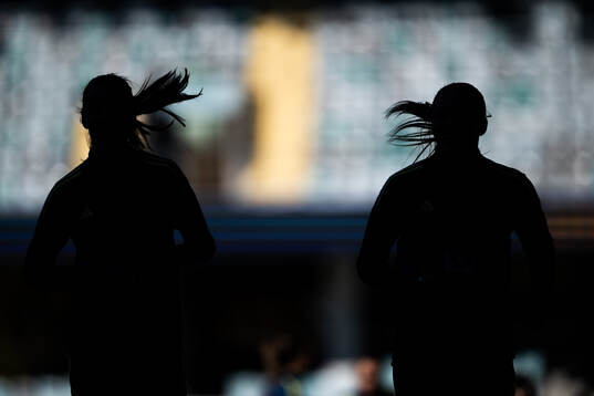 Silhouettes of Nathalie Björn and Magdalena Eriksson of