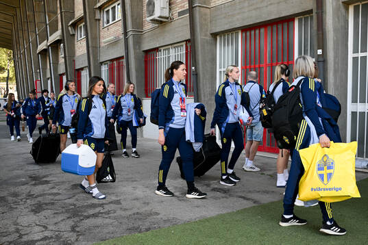 Players of Sweden arrive to the stadium