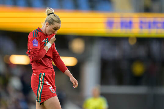 Rhiannon Roberts of Wales looks dejected