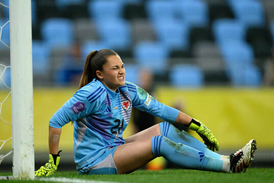 Goalkeeper Safia Middleton-Patel of Wales in pain