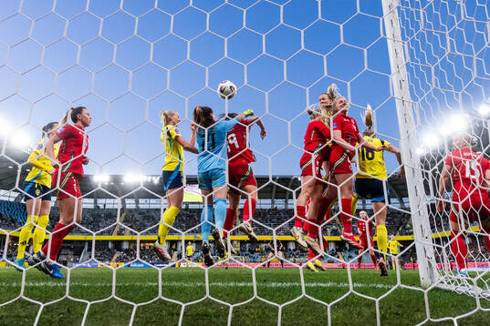 Magdalena Eriksson of Sweden scores 1-0 behind goalkeeper