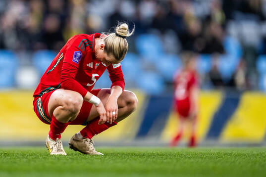 Rhiannon Roberts of Wales looks dejected