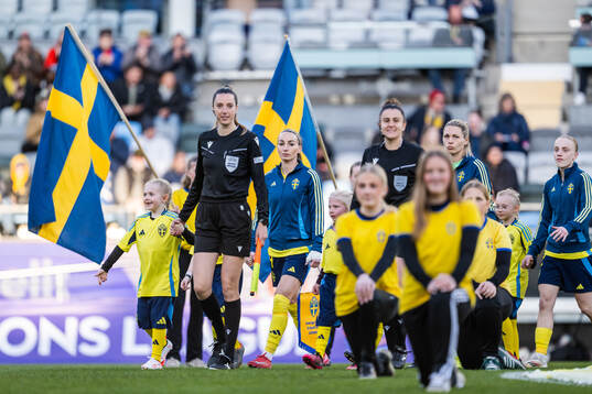 Kosovare Asllani, goalkeeper Jennifer Falk and Anna