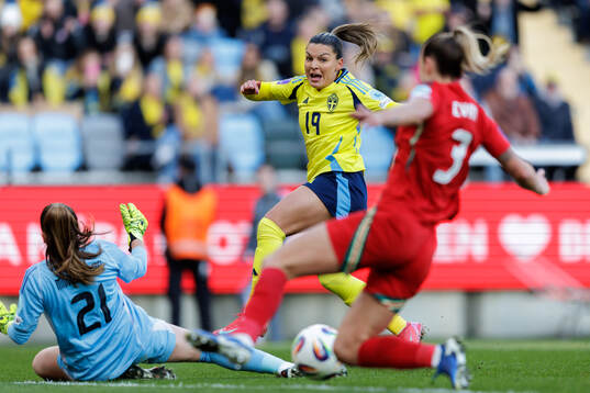 Johanna Rytting Kaneryd of Sweden against goalkeeper Safia