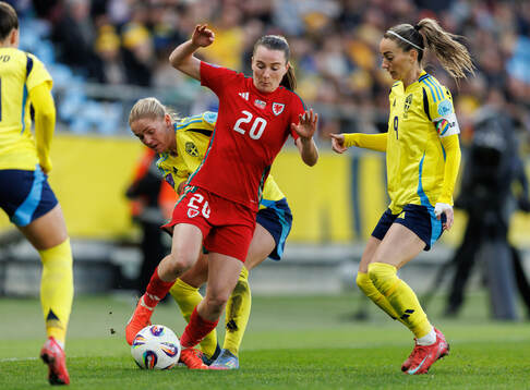 Carrie Jones of Wales against Hanna Lundkvist and Kosovare