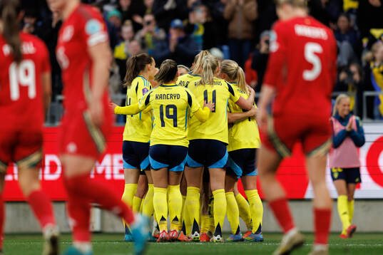 Players of Sweden celebrate the 1-0 goal by Magdalena