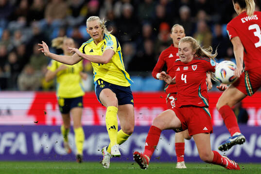 Stina Blackstenius of Sweden and Gemma Evans of Wales