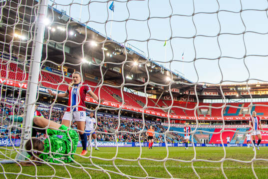 Mathilde Harviken of Norway reacts as goalkeeper Cecilie