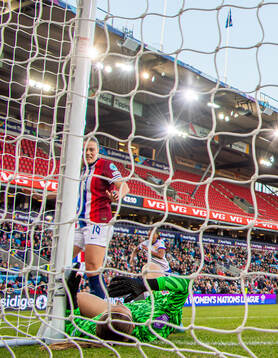 Mathilde Harviken of Norway reacts as goalkeeper Cecilie