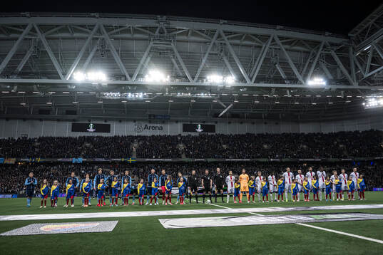 Players of of Djurgården and of Rapid Wien