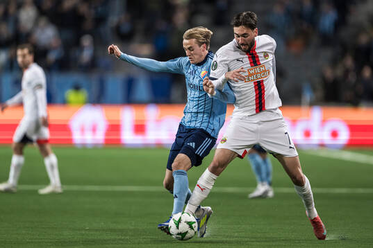 Oskar Fallenius of Djurgården and Dion Beljo of Rapid Wien