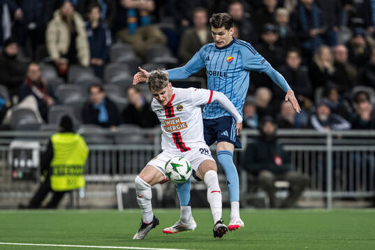 Moritz Oswald of Rapid Wien and Nino Zugelj of Djurgården