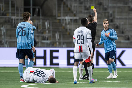 Hampus Finndell of Djurgården receives a yellow card