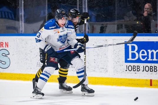 AIKs Eric Norin och Karlskogas Hampus Plato