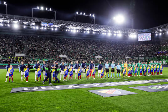Players of Djurgården and of Rapid Wien