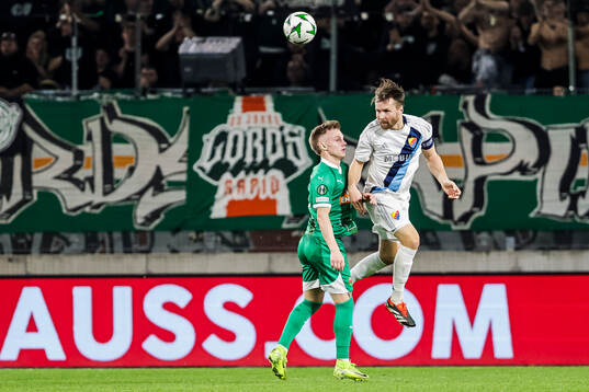Isak Jansson of Rapid Wien and Jacob Une of Djurgården