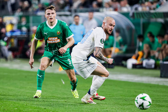 Benjamin Böckle of Rapid Wien and Adam Ståhl of