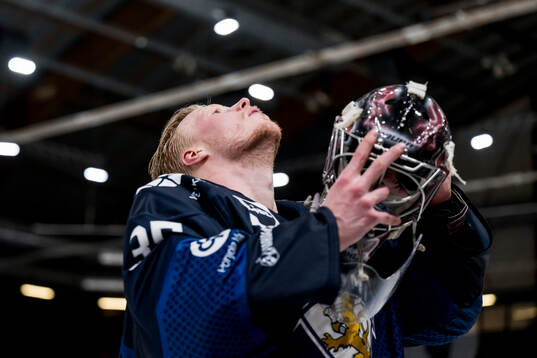 Goaltender Oskari Salminen of Finland