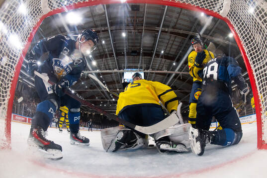 Patrik Puistola and Tommi Tikka of Finland compete for the