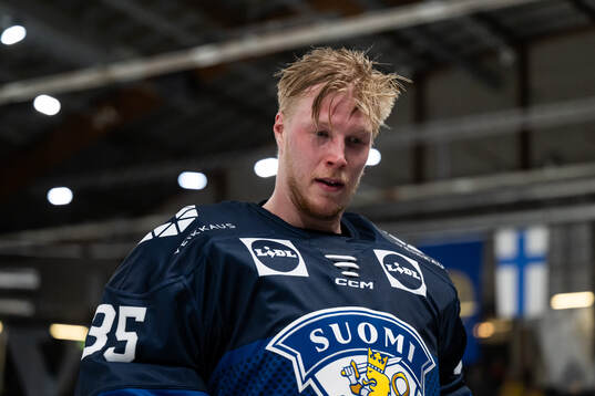 Goaltender Oskari Salminen of Finland