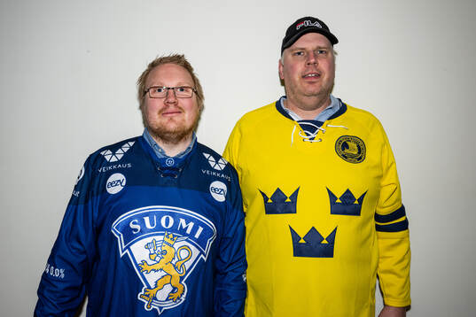 Spectators pose for a photo