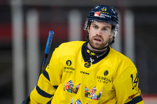 Oskar Lang of Sweden looks dejected