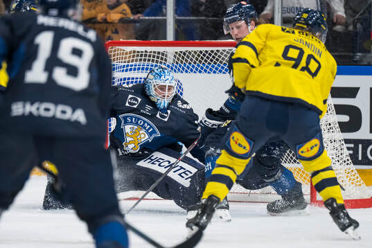 Goaltender Emil Larmi of Finland