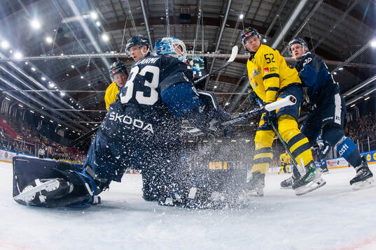 Filip Hållander and Felix Nilsson of Sweden compete for