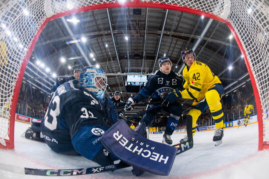 Goaltender Emil Larmi and Vili Saarijärvi of Finland