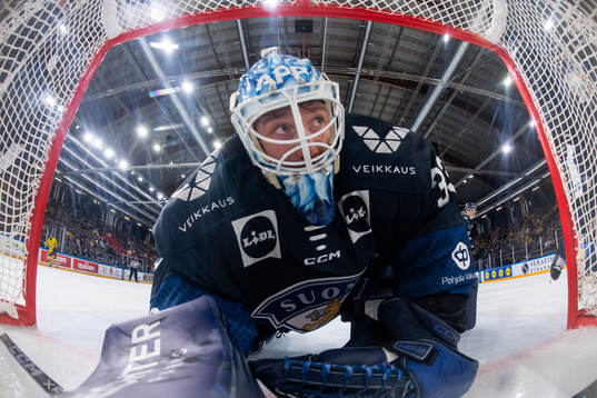 Goaltender Emil Larmi of Finland