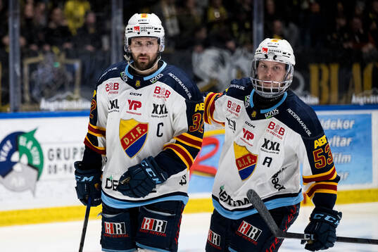 Djurgårdens Marcus Krüger och David Blomgren  jublar