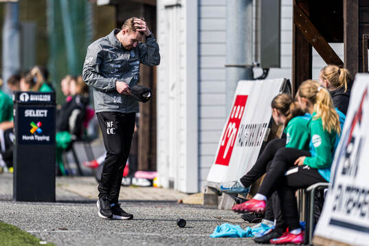 Nathan Flight, head coach of HamKam, looks dejected