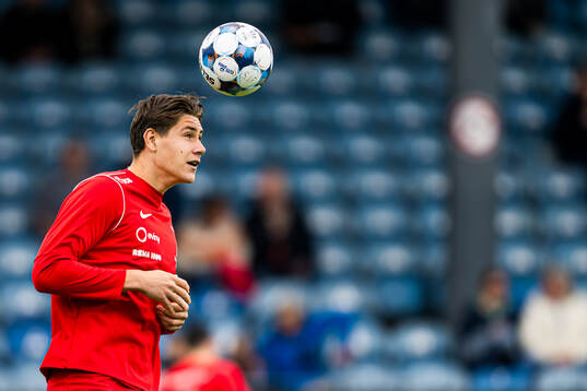 Eivind Helland of Brann warms up