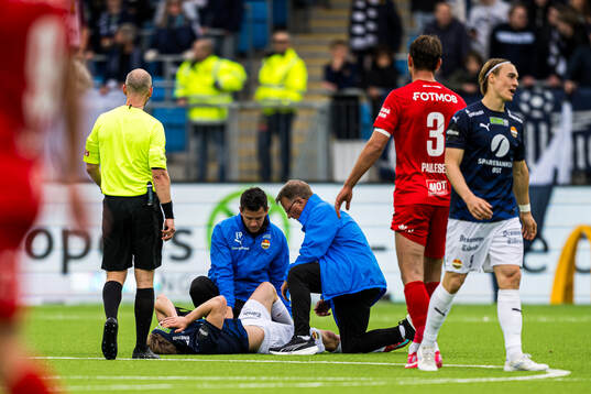 Jonas Torrissen Therkelsen of Strømsgodset with an injury