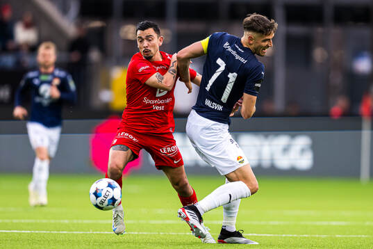 Niklas Castro of Brann and Gustav Valsvik of Strømsgodset