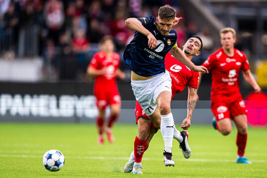 Niklas Castro of Brann and Gustav Valsvik of Strømsgodset