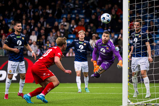 Aune Heggebø of Brann scores the 1-2 goal behind Per