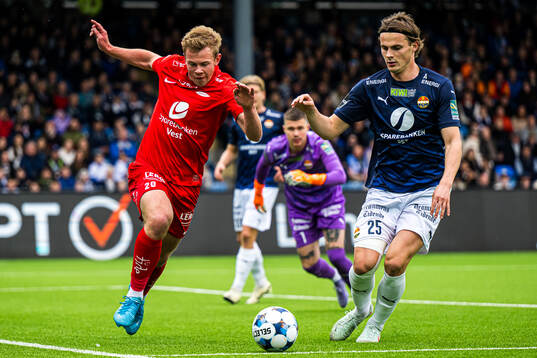 Aune Heggebø of Brann and Jesper Taaje of Strømsgodset