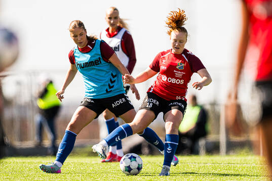 Maria Fink and Solveig Tomren Slemmen of Lyn warms up