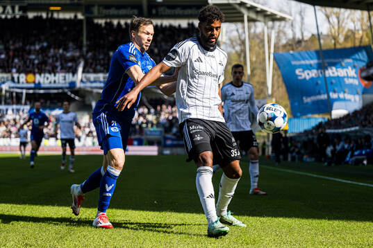 Martin Linnes of Molde and Emil Konradsen Ceide of Rosenborg