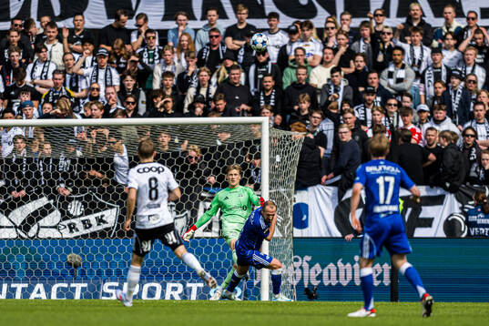 Sander Tangvik of Rosenborg and Veton Berisha of Molde