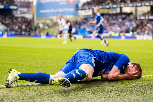 Eirik Haugan of Molde in pain