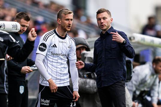 Erlend Dahl Reitan of Rosenborg and Alfred Johansson, head