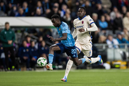 Tokmac Nguen of Djurgården and Benoit Badiashile of Chelsea