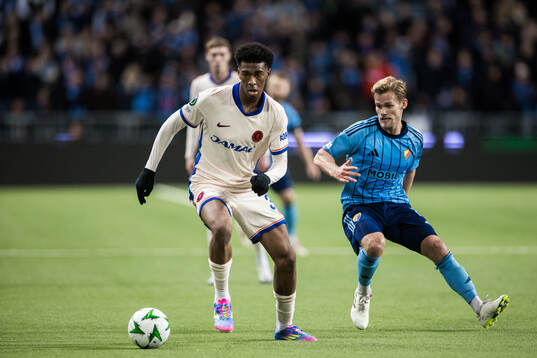 Joshua Acheampong of Chelsea and Hampus Finndell of