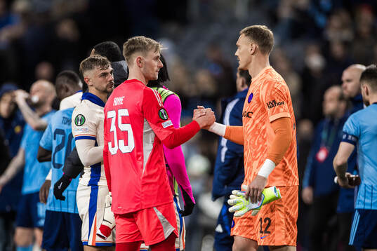 Goalkeeper Jacob Rinne of Djurgården and Filip Jørgensen