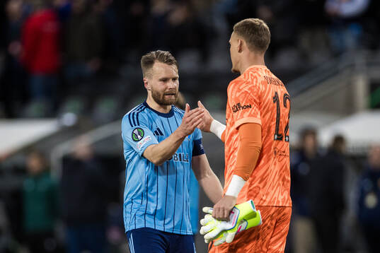Jacob Une of Djurgården and goalkeeper Filip Jørgensen of