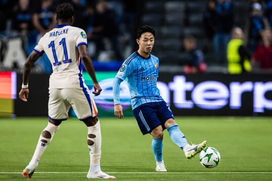 Keita Kosugi of Djurgården and Noni Madueke of Chelsea